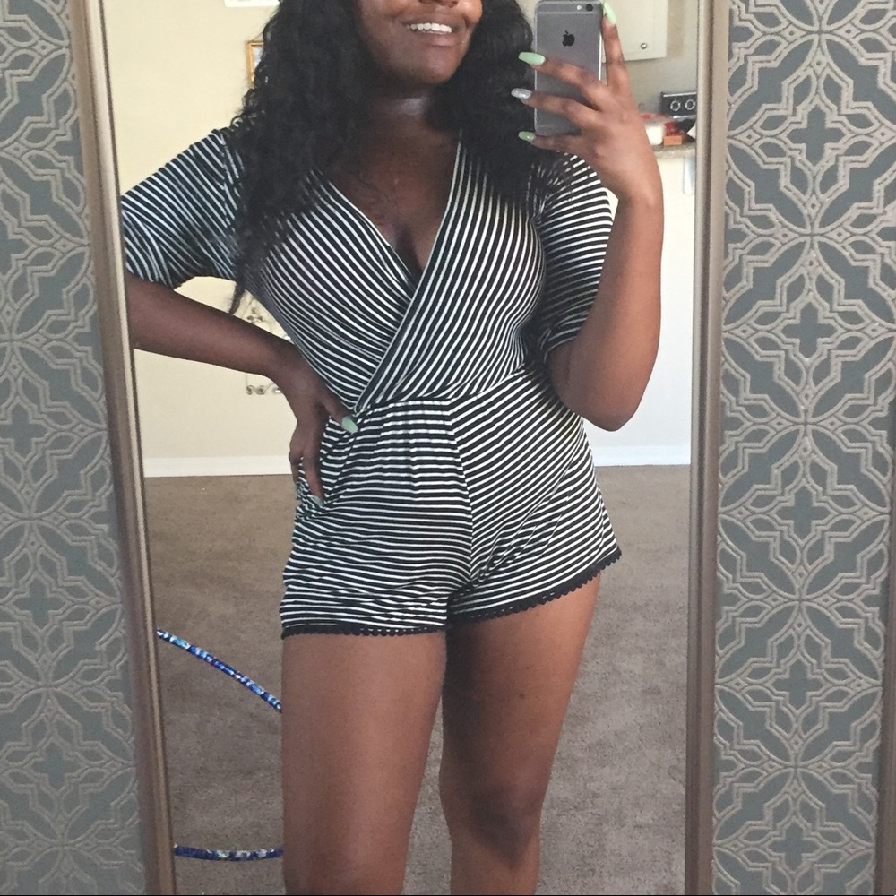 Long sleeved black and white striped romper